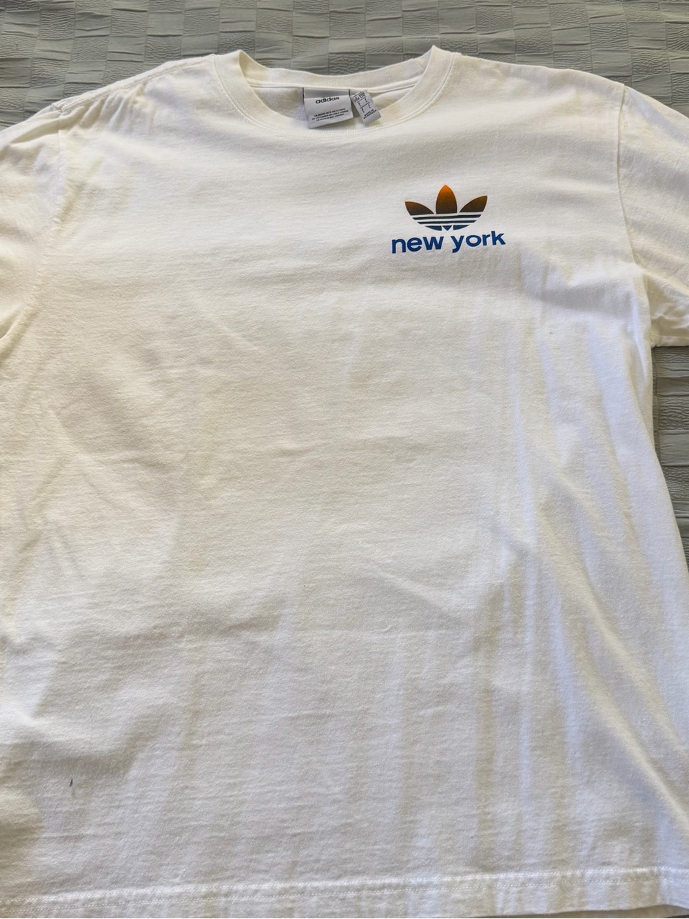 adidas White Short Sleeve Tee with Blue and Orange Logo
